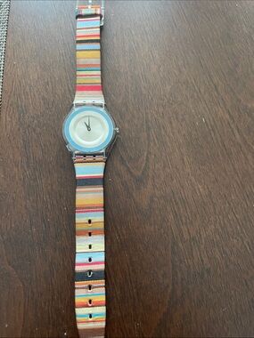 Swatch Clear Case Watch with Multicolor Striped Fabric Strap